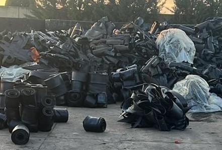 Uncured rubber with steel cord, post-industrial tire factory scrap stockpile